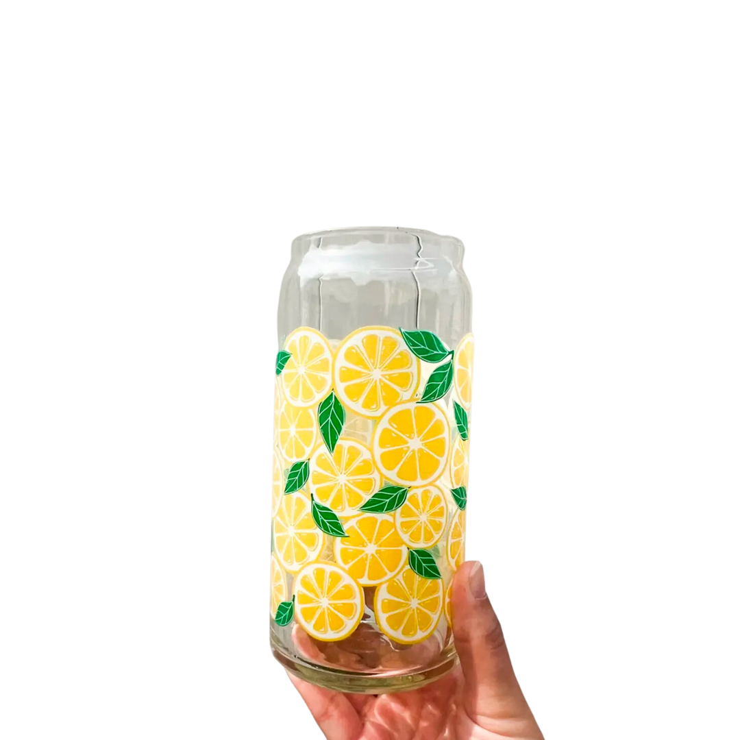 Glass cup with lemon design. This 20oz can glass cup is a great choice for hot and cold beverages. Its lemon design is printed seamlessly around the glass with high-quality, durable ink for long-lasting durability. Plus, it is dishwasher safe and can last through more than 300 dishwasher cycles on the top rack.