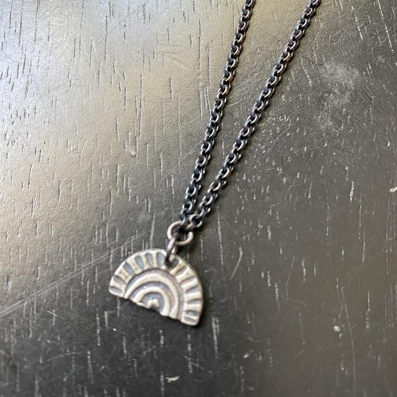 Tiny Silver "Sun-Bow" Necklace (downward facing, loose bow)