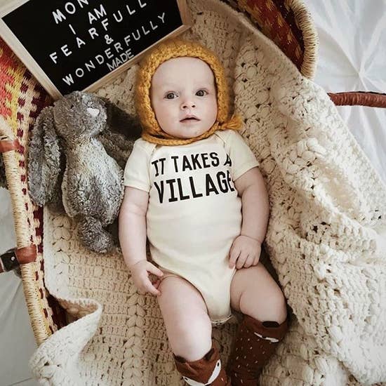 It Takes A Village Onesie